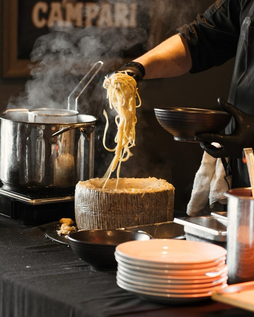 Italian pasta in cheese wheel at Trattoria Pasquale in Tampa, Florida